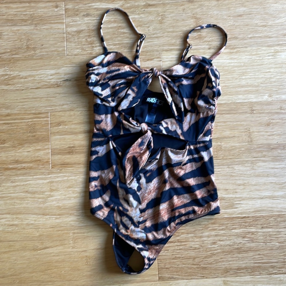 Beach riot one piece swim suit with two open area in the front
